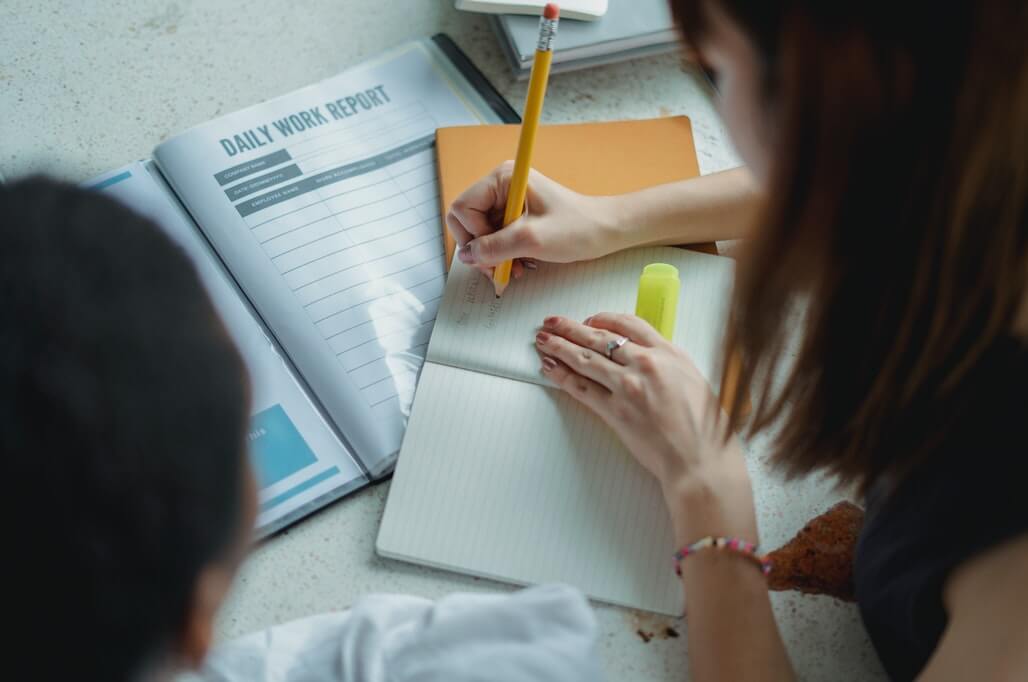 woman taking notes about her day