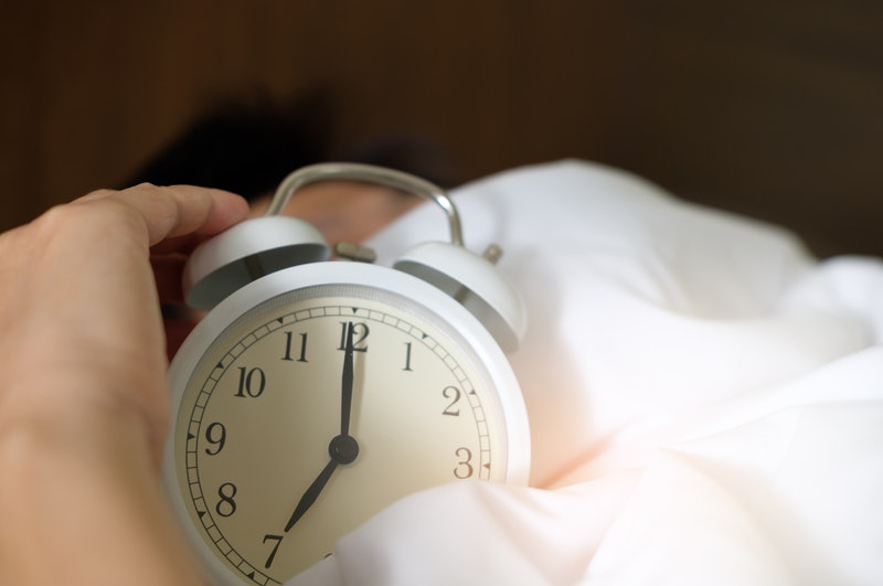 clock within bed sheets