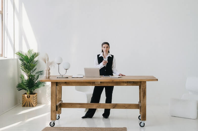 woman working from home while standing